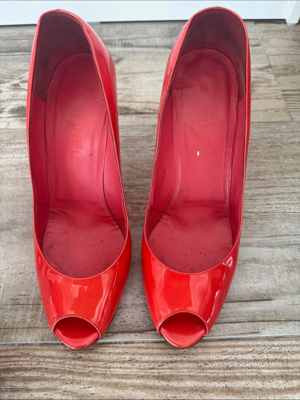 CHANEL glossy red